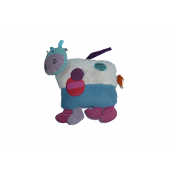Doudou peluche musicale vache Les Jolis pas Beaux Moulin Roty